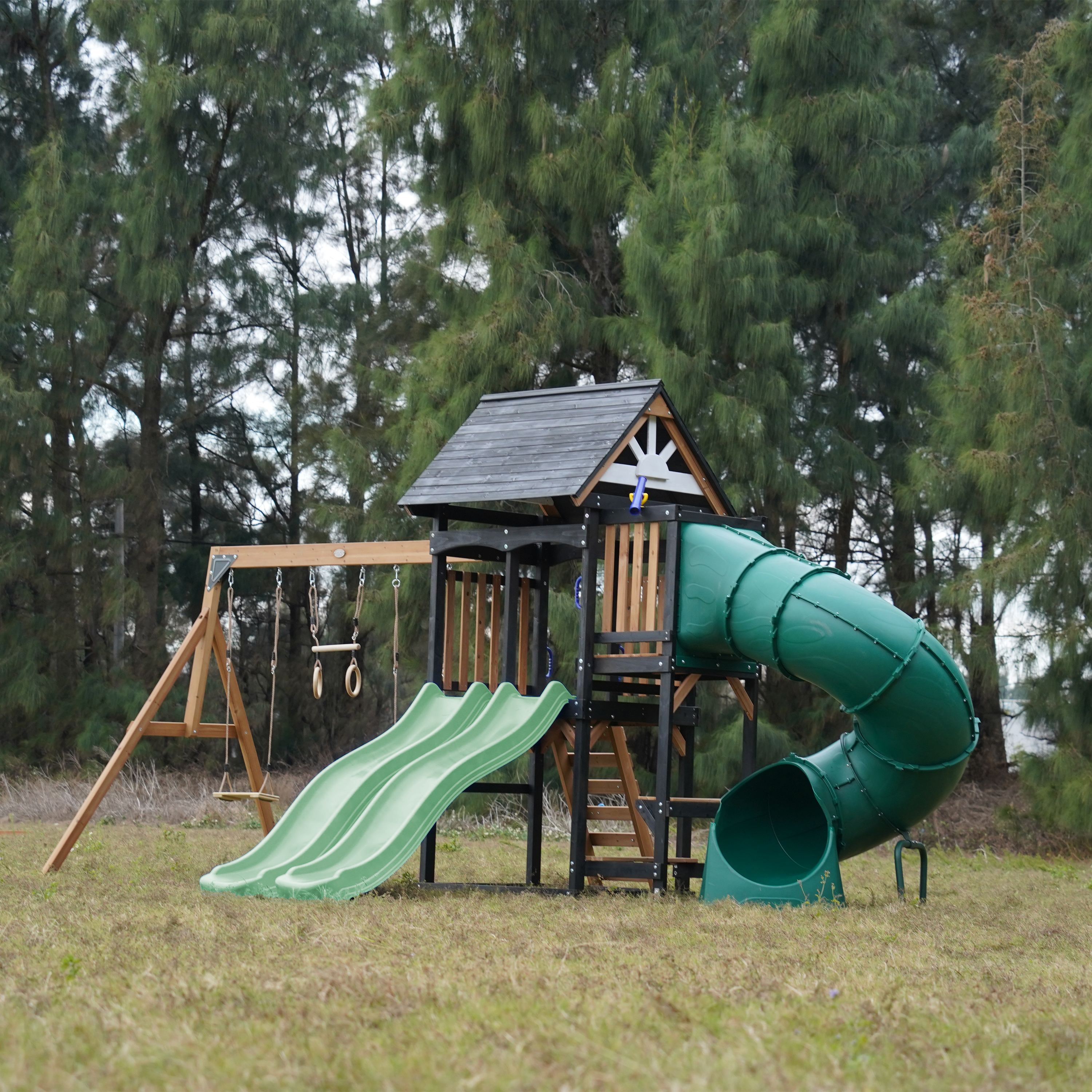 AXI Cody Climbing Frame with Swings, Trapeze and Climbing Wall – Pastel Green Double Slide and Tube Slide