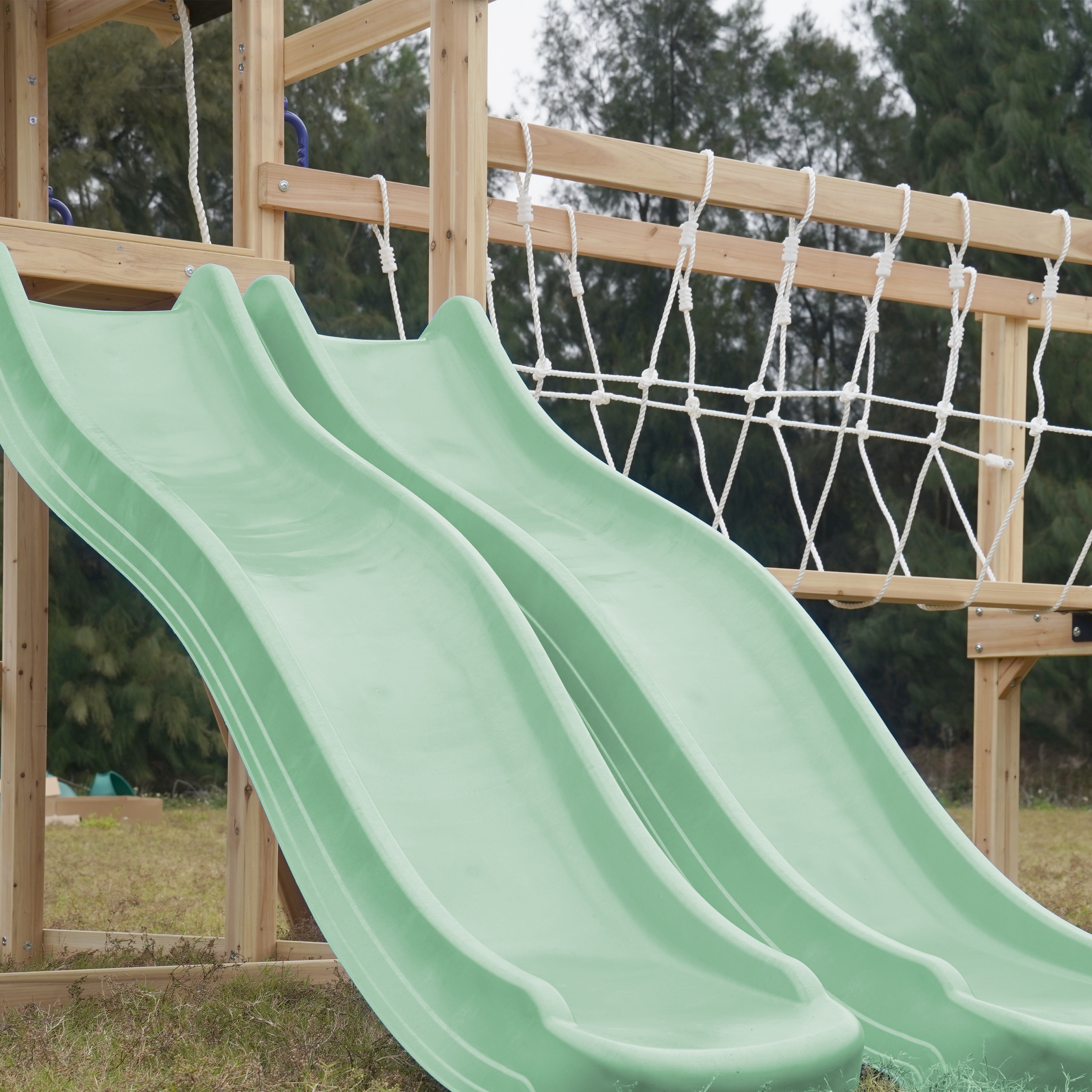 AXI Hunter Climbing Frame with Swings, Climbing Frame, Climbing Bridge and Multiple Platforms – Pastel Green Double Slide