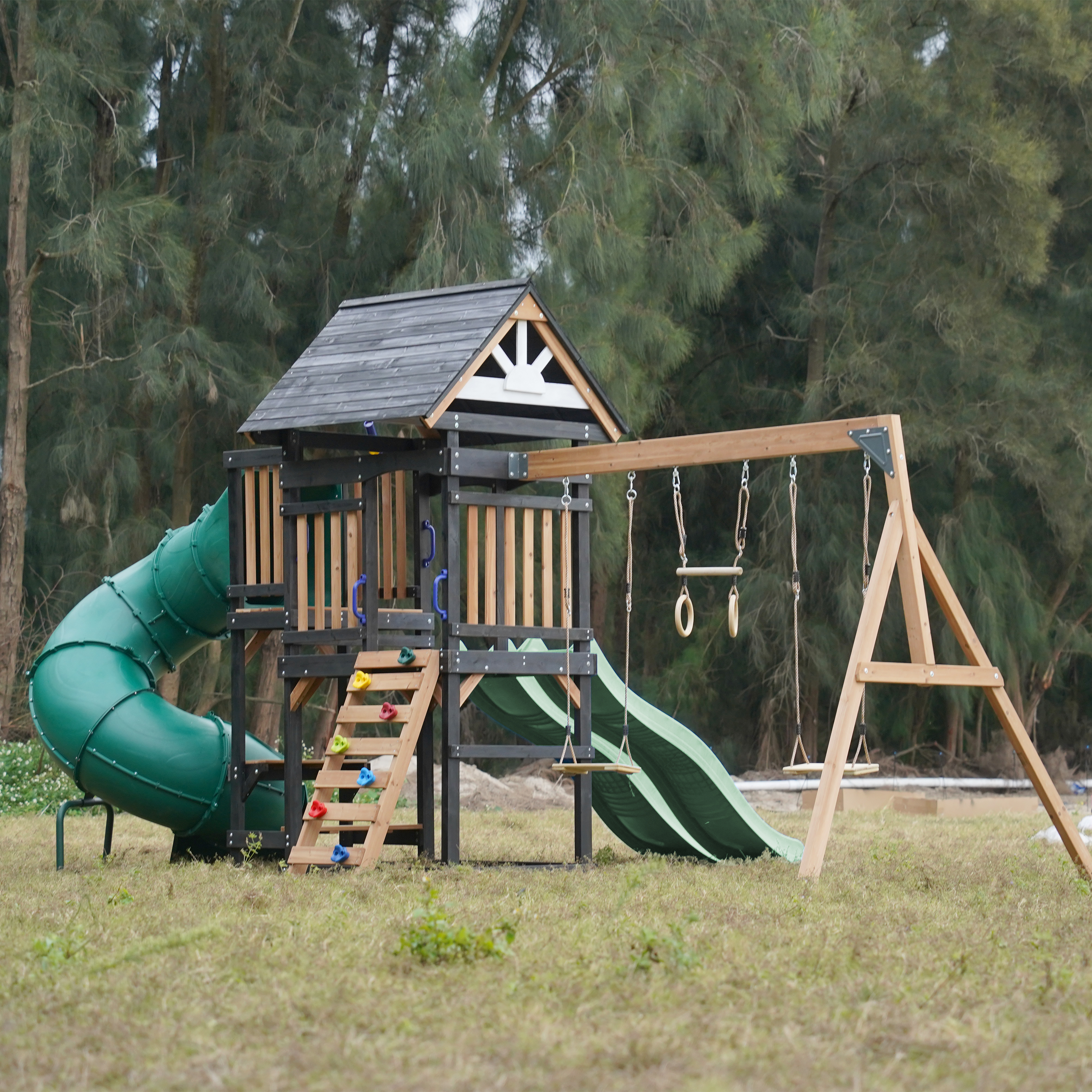 AXI Cody Climbing Frame with Swings, Trapeze and Climbing Wall – Pastel Green Double Slide and Tube Slide