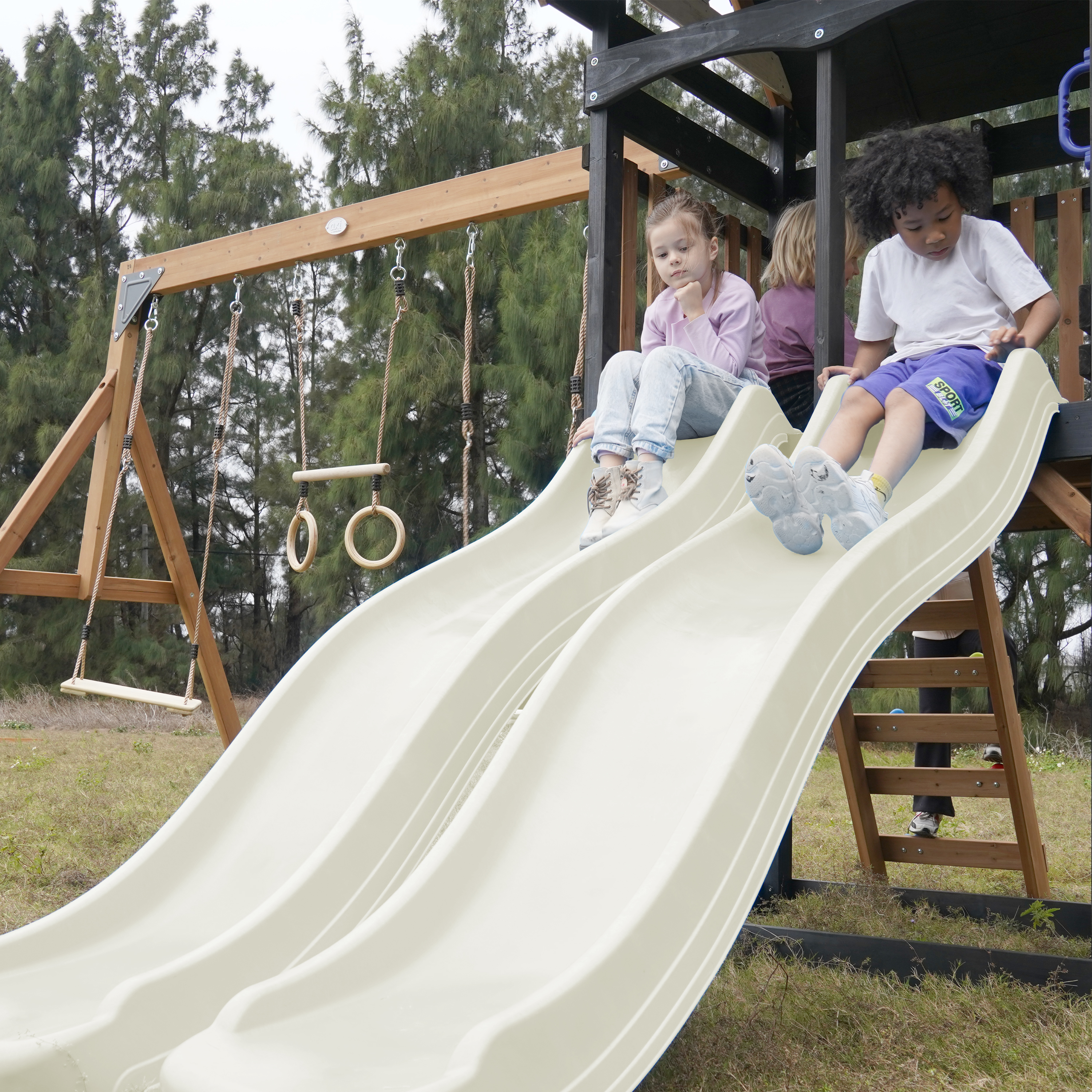 AXI Cody Climbing Frame with Swings. Trapeze and Climbing Wall – Cream Double Slide and Tube Slide